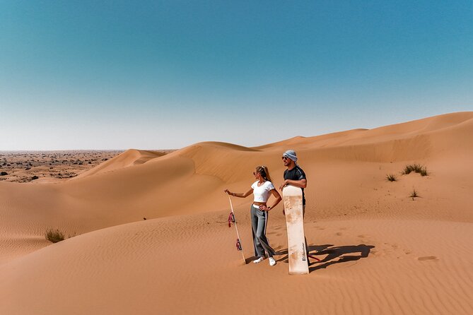 Dubai Evening Desert Safari: Sandboarding, BBQ, Camel Ride & more - Dune bashing: exciting, rough, and not for everyone