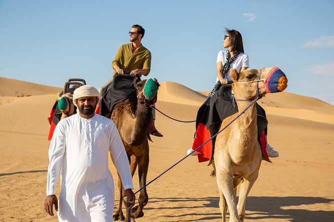 Dubai Evening Desert Safari: Sandboarding, BBQ, Camel Ride & more - Looking up at the stars before returning