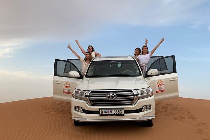 Dubai Evening Desert Safari with BBQ & Live Entertainment - Sandboarding and the short camel ride