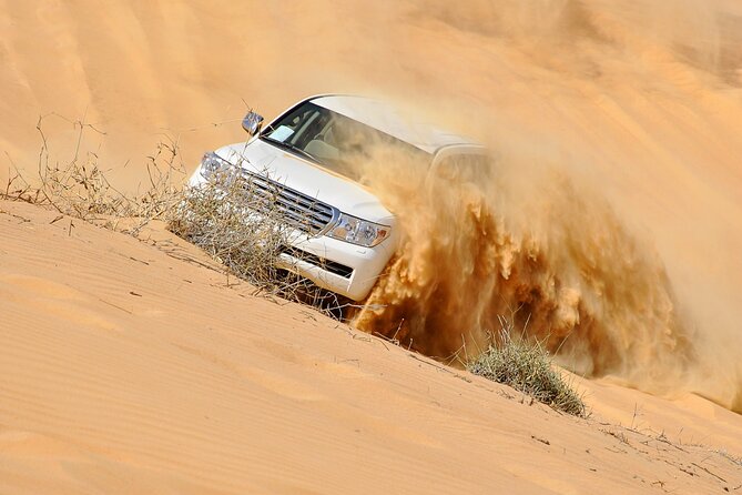 Dubai Evening Desert Safari With Transfers Dune Bashing & Dinner - Key Details Before You Book