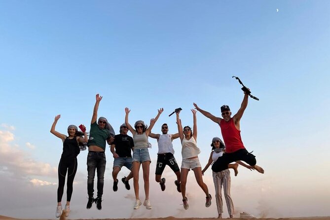 Dubai Evening Desert Safari With Transfers Dune Bashing & Dinner - Camel Ride, Falconry, and Camp Activities