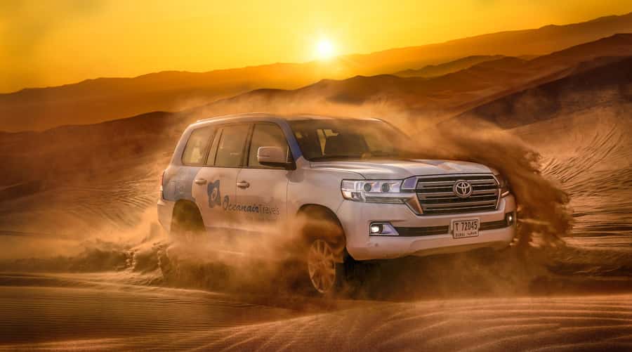 Dubai: Helicopter Ride, Desert Safari, Camels & Refreshments - Sandboarding and the photo stop