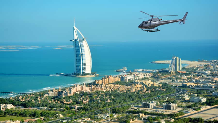 Dubai: Helicopter Ride, Desert Safari, Camels & Refreshments - A short camel ride with a traditional feel