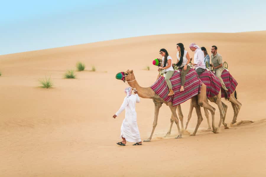 Dubai: Heritage Camel Desert Safari with Traditional Dinner - Pickup from your Dubai hotel, with a late afternoon start