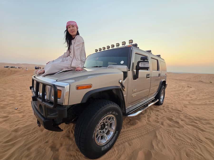 Dubai Hummer Safari Adventure & Traditional Dress Photoshoot - Sandboarding and the short camel ride