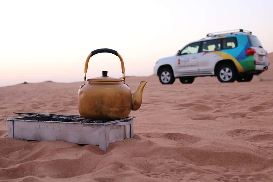 Dubai: Morning Desert Safari with Camel Ride & Sandboarding - Hotel pickup makes the early start simple