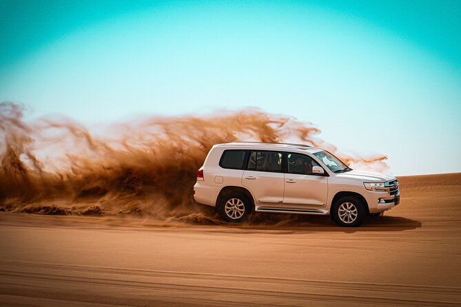 Dubai Morning Evening Desert Safari,Sand boarding and Camel ride - Leaving Dubai for Lahbab’s red dunes