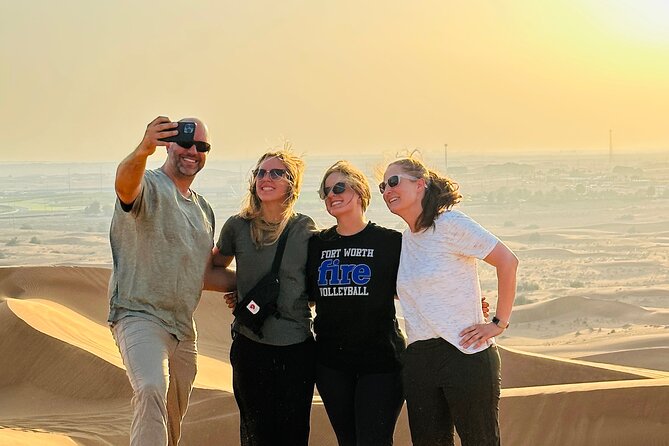 Dubai Morning Evening Desert Safari,Sand boarding and Camel ride - Sandboarding is simple, social, and fun