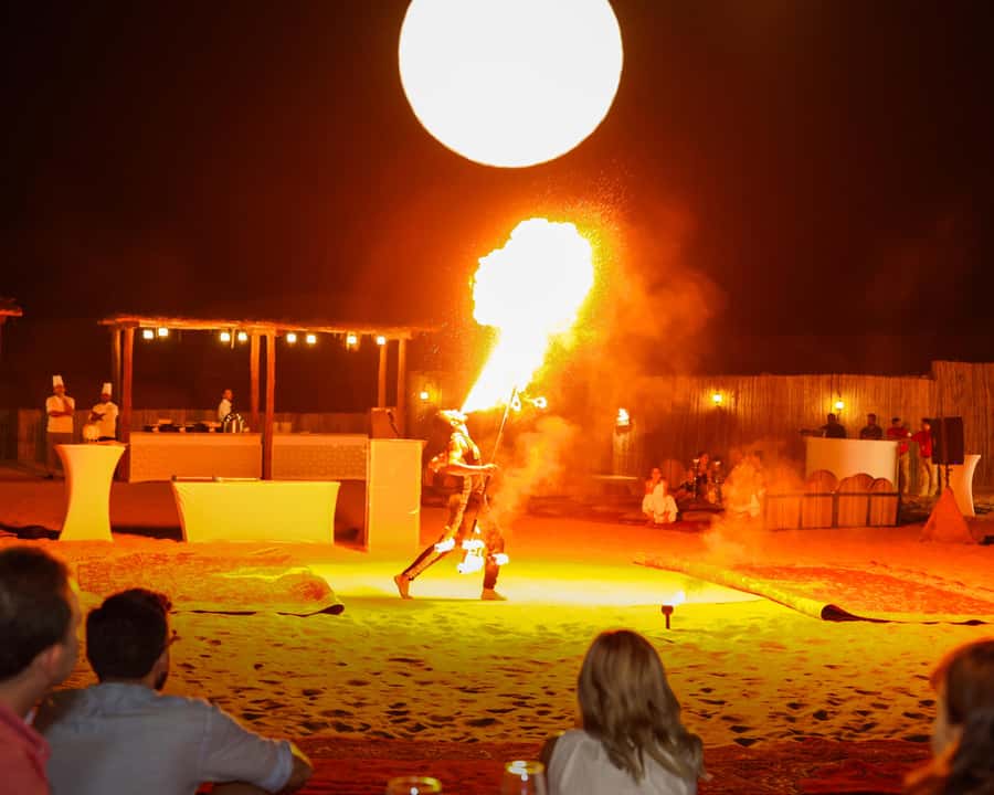 Dubai: Premium Desert Safari, Camel Ride, BBQ & Sandboarding - Camel rides, sandboarding, and henna at camp