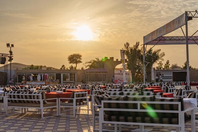 Dubai Premium Desert Safari – Live Buffet Dinner & Luxury Camp - Sandboarding adds a simple, hands-on activity