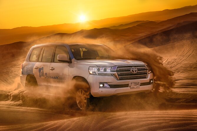 Dubai Premium Red Dunes Safari, Camels & 5<em> BBQ at Al Khayma camp – Key points to know before booking’ /></p>
<ul>
<li><strong>Red dunes in Lahbab:</strong> The tall red sands provide a more dramatic setting than a short desert photo stop near Dubai.</li>
<li><strong>Seven hours from pickup to return:</strong> Plan on much of your day and evening being committed to the safari.</li>
<li><strong>Dune bashing and sandboarding included:</strong> The main 4WD drive lasts about 30 to 45 minutes, with a sandboarding stop.</li>
<li><strong>Al Khayma Camp offers many extras:</strong> Camel rides, Arabic coffee, dates, sweets, henna, falcon photos, local clothing, shisha, and camel feeding are included.</li>
<li><strong>Dinner comes with live shows:</strong> The buffet includes vegetarian and non-vegetarian dishes, BBQ, desserts, Tanoura, Khaliji dance, and an evening fire show.</li>
<li><strong>ATVs cost extra:</strong> Quad biking is available only with selected tickets or by request, and it carries separate safety and insurance concerns.</li>
</ul>
<h2>The long ride from Dubai to Lahbab</h2>
<p> BBQ at Al Khayma camp – The long ride from Dubai to Lahbab’ /></p>
<p><p>Your day begins with pickup from a hotel or selected address in Dubai, Sharjah, or Ajman. Some locations may cost extra. Pickup can take place within 45 minutes before your chosen departure time, so keep your phone nearby and wait in the hotel lobby as instructed.</p>
</p>
<p><p>The drive toward Lahbab takes about an hour in an air-conditioned 4WD. This transfer is more than a simple ride across town. Guides often explain Dubai’s growth, point out notable buildings and palace areas, and share personal pride in the city. Rashid Mir was praised for making the drive informative and friendly, while drivers such as Yusir and Sunil were noted for keeping the mood light.</p>
</p>
<p><p>The vehicle is shared, with a maximum of six people listed for the activity. That smaller vehicle size is a plus, but it does not make the safari private. You may still share the camp and desert activities with a much larger crowd.</p>
</p>
<p><p>I recommend eating a light meal two or three hours beforehand. A full stomach and fast turns over sand are a poor combination. Wear loose clothing, sports shoes for sandboarding, and bring a jacket in winter. Summer calls for light clothing, though modest dress remains sensible for a public cultural experience.</p>
</p>
<div class="twil" style="margin: 20px 0; padding: 15px 0;"><p>More Camel Ride Safaris in Dubai</p><ul style="margin: 10px 0; padding-left: 0; list-style: none;"><li style="margin: 0 0 12px 0; padding: 0 0 12px 0; border-bottom: 1px solid #F7EDDE; line-height: 1.4;"><a href="https://safaritourer.com/dubai-desert-safari-quad-bike-camel-ride-al-khayma-camp/">Dubai: Desert Safari, Quad Bike, Camel Ride & Al Khayma Camp</a><br><span style="font-size: 0.82em; color: #555;"><span style="color: #C97F12;">★</span> 4.9 &nbsp;&middot;&nbsp; 68,962 reviews</span></li><li style="margin: 0 0 12px 0; padding: 0 0 12px 0; border-bottom: 1px solid #F7EDDE; line-height: 1.4;"><a href="https://safaritourer.com/dubai-desert-safari-quad-bike-camel-ride-and-sandboarding/">Dubai: Desert Safari, Quad Bike, Camel Ride and Sandboarding</a><br><span style="font-size: 0.82em; color: #555;"><span style="color: #C97F12;">★</span> 4.9 &nbsp;&middot;&nbsp; 43,505 reviews</span></li><li style="margin: 0; padding: 0; border-bottom: none; line-height: 1.4;"><a href="https://safaritourer.com/dubai-safari-quad-bike-camel-ride-and-buffet-dinner/">Dubai: Safari, Quad Bike, Camel Ride, and Buffet Dinner</a><br><span style="font-size: 0.82em; color: #555;"><span style="color: #C97F12;">★</span> 4.9 &nbsp;&middot;&nbsp; 33,424 reviews</span></li></ul></div><h2>Lahbab’s red dunes and the main dune bash</h2>
<p><img width="669" height="446" decoding="async" src=