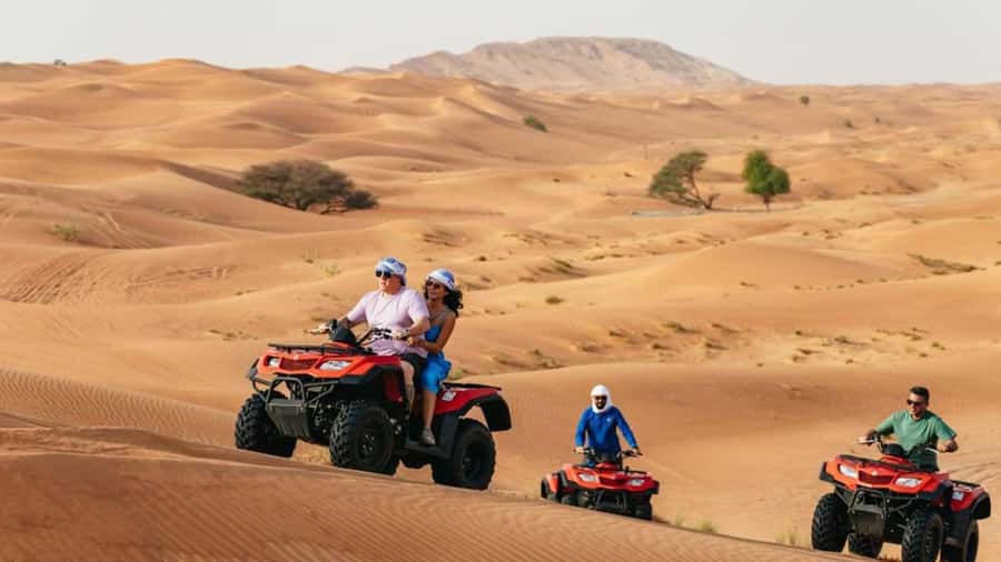 Dubai: Quad & ATV Bike, Red Dune Desert and Safari Adventure - Leaving Dubai for the red dunes