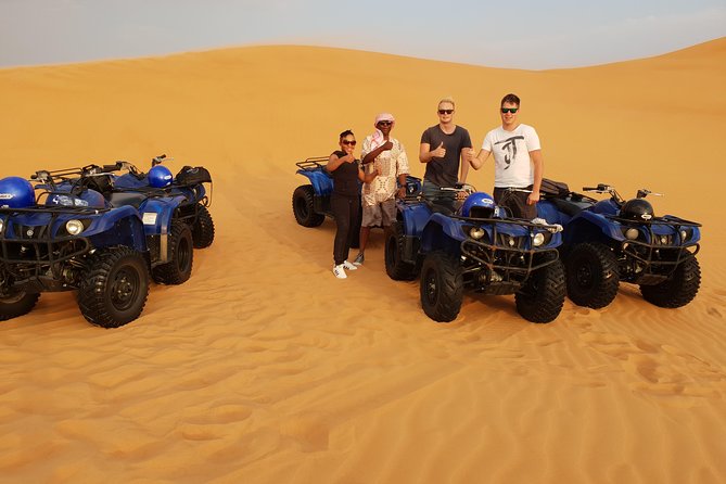 Dubai: Quad Bike Safari, Camels, & Camp with BBQ Dinner - Leaving Dubai for the red dunes
