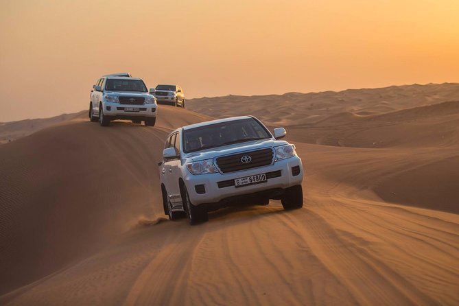 Dubai Red Dunes Desert Safari : Sandboarding, BBQ & Live Shows - Leaving Dubai for the Lahbab red dunes