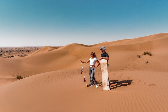 Dubai Red Dunes Safari: Dune Bashing, Camel Ride & Breakfast - Dune bashing across steep red sand