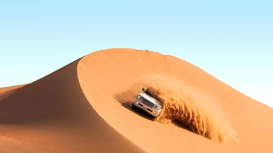 Dubai: Safari, Quad Bike, Camel Ride, and Buffet Dinner - Dune bashing is the day’s main thrill