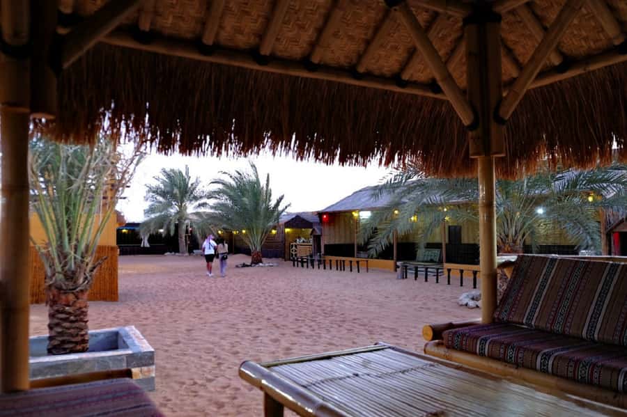 Dubai: Safari, Quad Bike, Camel Ride, and Buffet Dinner - Sandboarding gives you a quieter way to enjoy the dunes