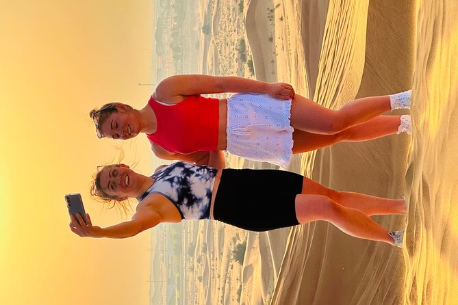 Dubai Sunset Red Dune Desert Safari, Sandboarding and Camel Ride - Sunset photographs in the open desert
