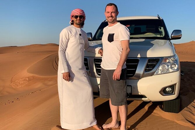 Dubai: Unique SUNSET 4WD Red Dunes Safari - Sandboarding and the Camel Ride