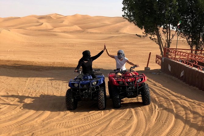 Dubai: Unique SUNSET Quad Bike Red Dunes Safari - Key points at a glance