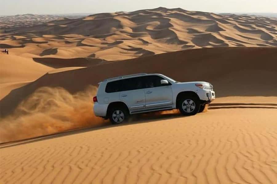 Dune Bashing &Beyond The Ultimate Desert Safari From Doha - Leaving Doha in an air-conditioned 4WD