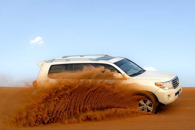 Evening Desert Safari in Dubai, Sandboard & BBQ Dinner - What dune bashing is really like