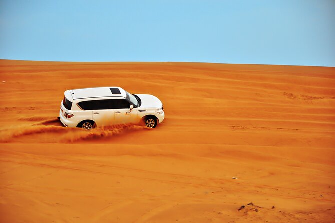 Evening Desert Safari Tour With Dinner & Entertainment - Sunset stops are the best time for photographs