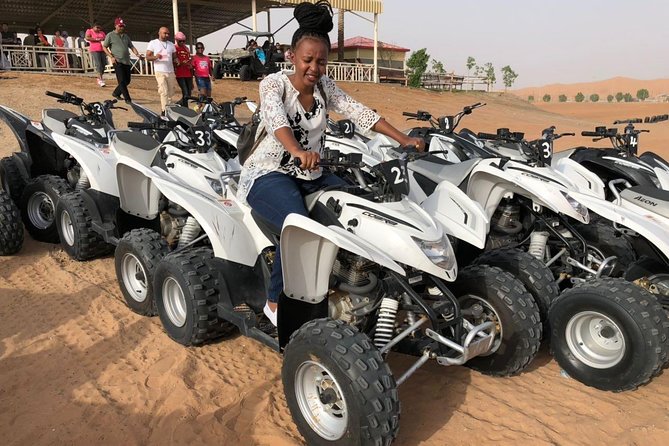 Evening Desert Safari with Quad Bike, Dune Bashing, Entertainments, BBQ Dinner - The high dune, sandboarding, and sunset