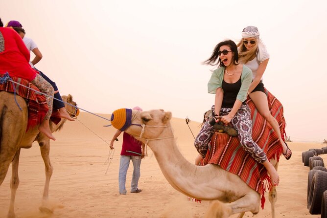 Evening Dubai Safari with BBQ, Dance Shows & Quad Biking optional - Belly dancing, Tanura, and the fire show