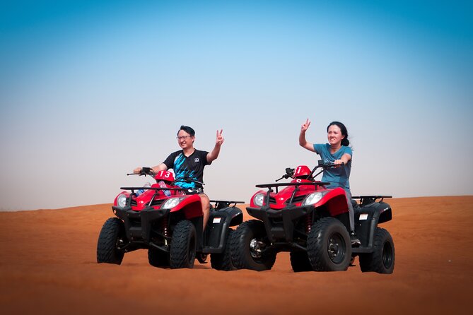 Evening Quad Bike, Desert Safari in Dubai , BBQ Dinner and Shows - Quad biking in the fenced desert area