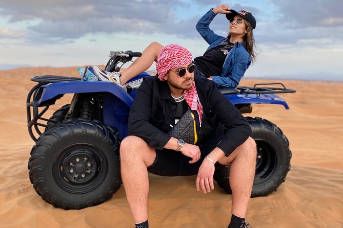 Evening Quad Bike, Desert Safari in Dubai , BBQ Dinner and Shows - Sandboarding, camel riding, and desert photos