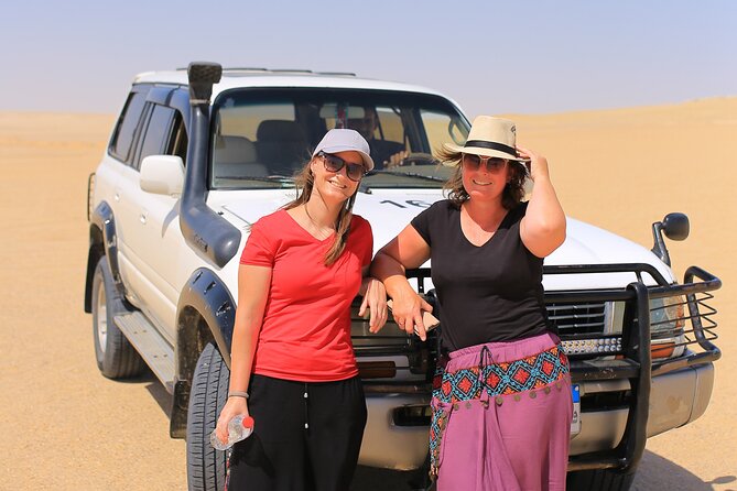 From Cairo 4x4 Safari, Camel Ride, Magic Lake, Waterfalls & Lunch - Dune bashing and sandboarding in a 4x4