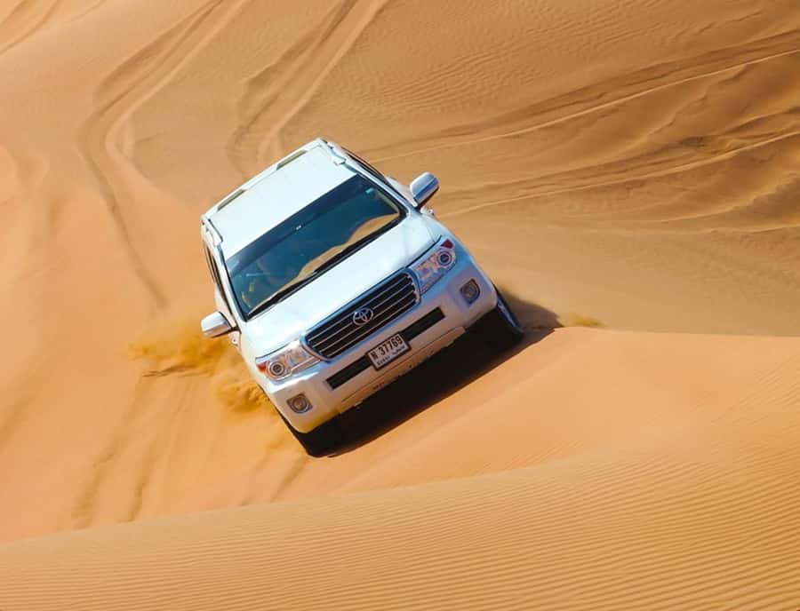 From Doha: Inland Sea Desert Safari with All Activities - The camel ride: a slow start with a traditional feel