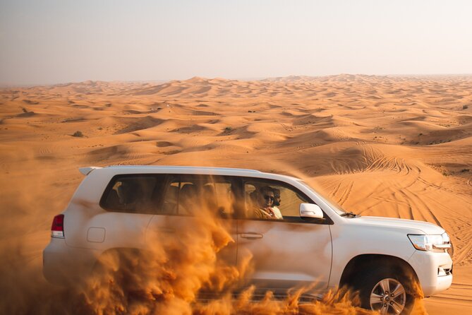 Full Day Safari Grand Adventures with Dune Bash on 4X4 in Dubai - Red dunes, 4x4 thrills, and sunset photos