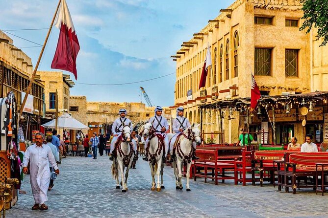 Fullday City Tour and Desert Safari with Camel Ride and SandBoard - The Pearl Island: a polished contrast