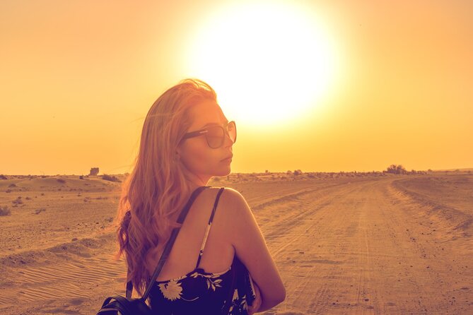 Morning Desert Safari From Abu Dhabi -Camel Ride,Sand Boarding,Camel Farm Visit - Sandboarding on the golden dunes