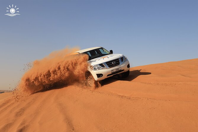 Morning Desert Safari in Dubai with Camel Ride - Sandboarding on the dunes