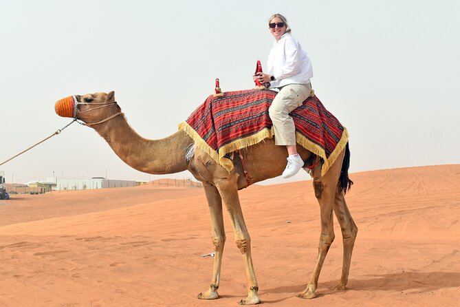 Morning Desert Safari, Quad Bike, Sandboard and Camel Ride - Dune bashing across the red sand