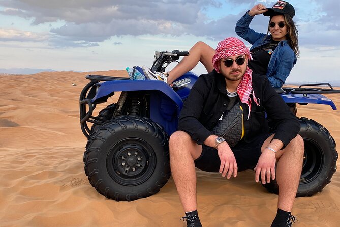 Morning Desert Safari, Quad Bike, Sandboard and Camel Ride - Camel feeding and a short ride