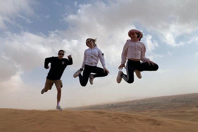Morning Desert Safari, Quad Bike, Sandboard and Camel Ride - Dates, drinks, and Arabic coffee