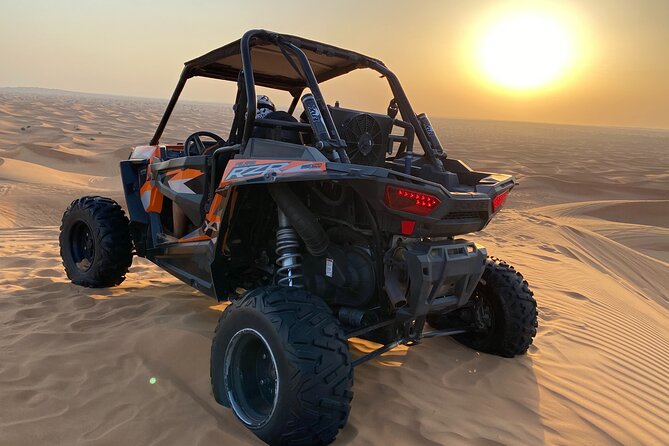 Morning Desert Safari with Buggy Ride & Sandboarding – Shared Car - Camel riding and sandboarding keep the pace varied