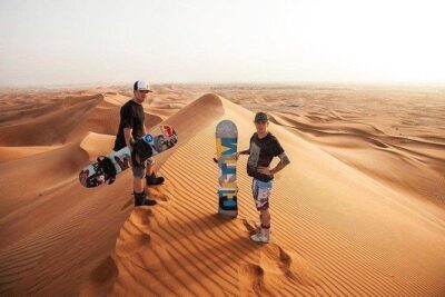 Morning Desert Safari with Quad Bike, Camel Ride & Sandboarding