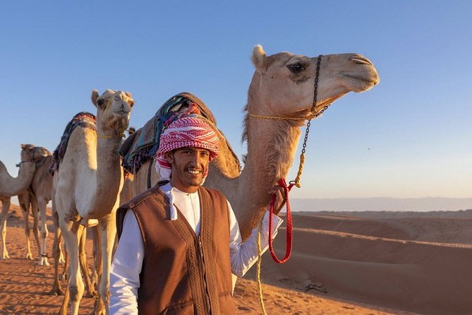Morning Desert Safari with Quad Bike, Camel Ride & Sandboarding - A short camel ride with a traditional touch