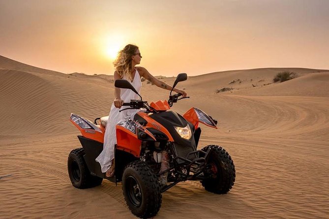 Morning Desert Safari with Quad Bike, Camel Ride & Sandboarding - The 35 to 45-minute dune-bashing session