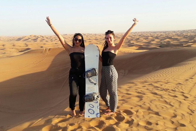 Morning Dubai Desert Safari with Sand boarding and Camel Ride - A short camel ride with time for photos