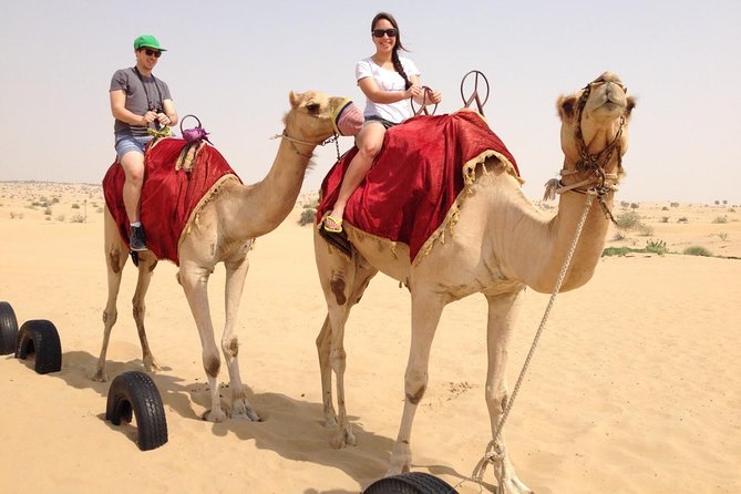 Morning Dubai Desert Safari with Sand boarding and Camel Ride - What the $75 price really covers