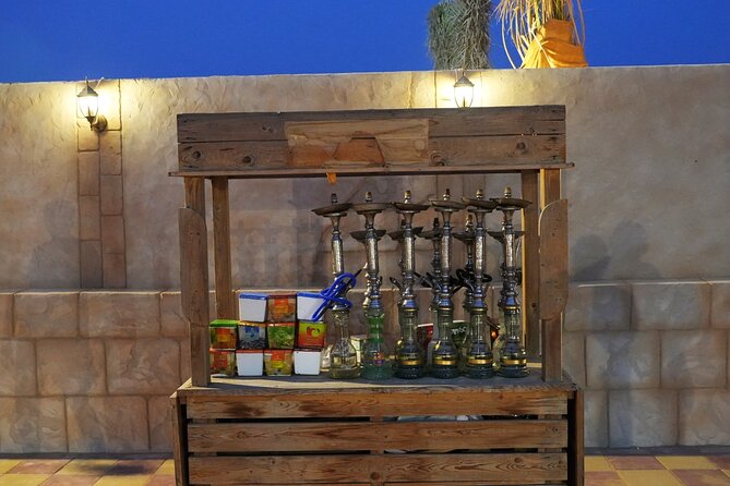 Premium Deluxe Dubai Safari with Camel Ride, Sandboard & BBQ - The evening shows, from tanoura to fire