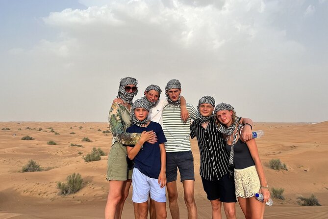 Premium Desert Safari Activities for Group and Family - Camp activities: camel riding, sandboarding, and henna