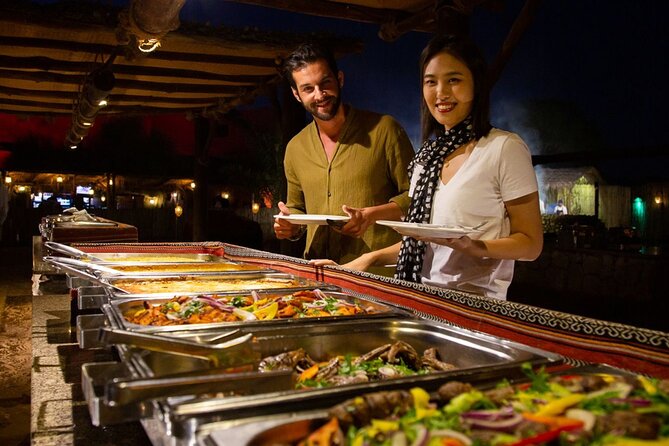 Premium Desert Safari Dubai : Dune Bashing, Camel Ride with BBQ - Belly Dancing, Tanoura, Khaliji Dancing, and Fire