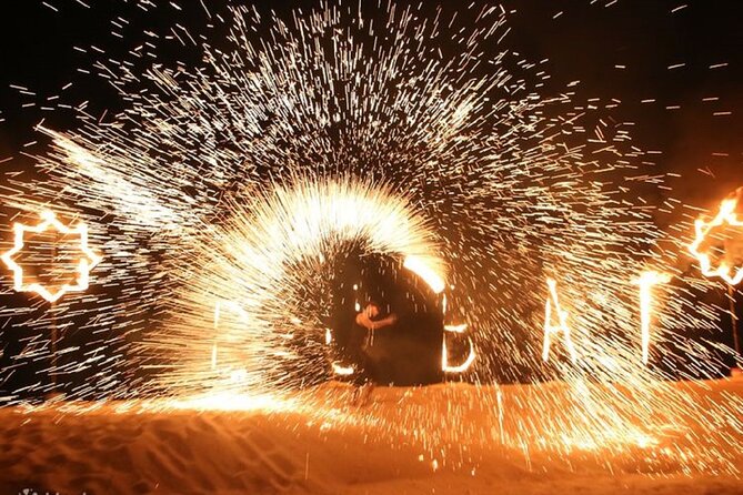 Premium Evening Desert Safari Dubai with Camel Ride & BBQ Dinner - Belly dance, Tanoura, and a live fire show